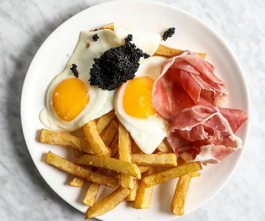 Fried eggs with Jamón and Caviar
